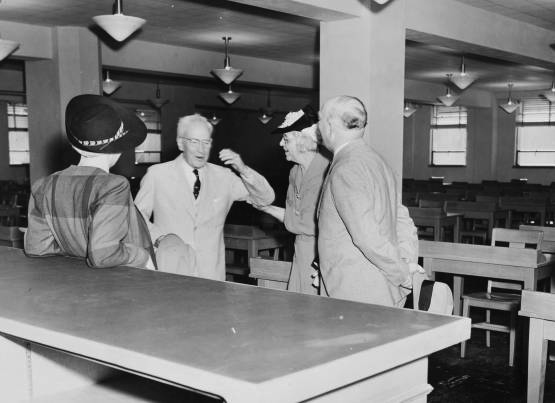 John Bennes (second from left) in new library addition at Oregon State University, May 11, 1941.