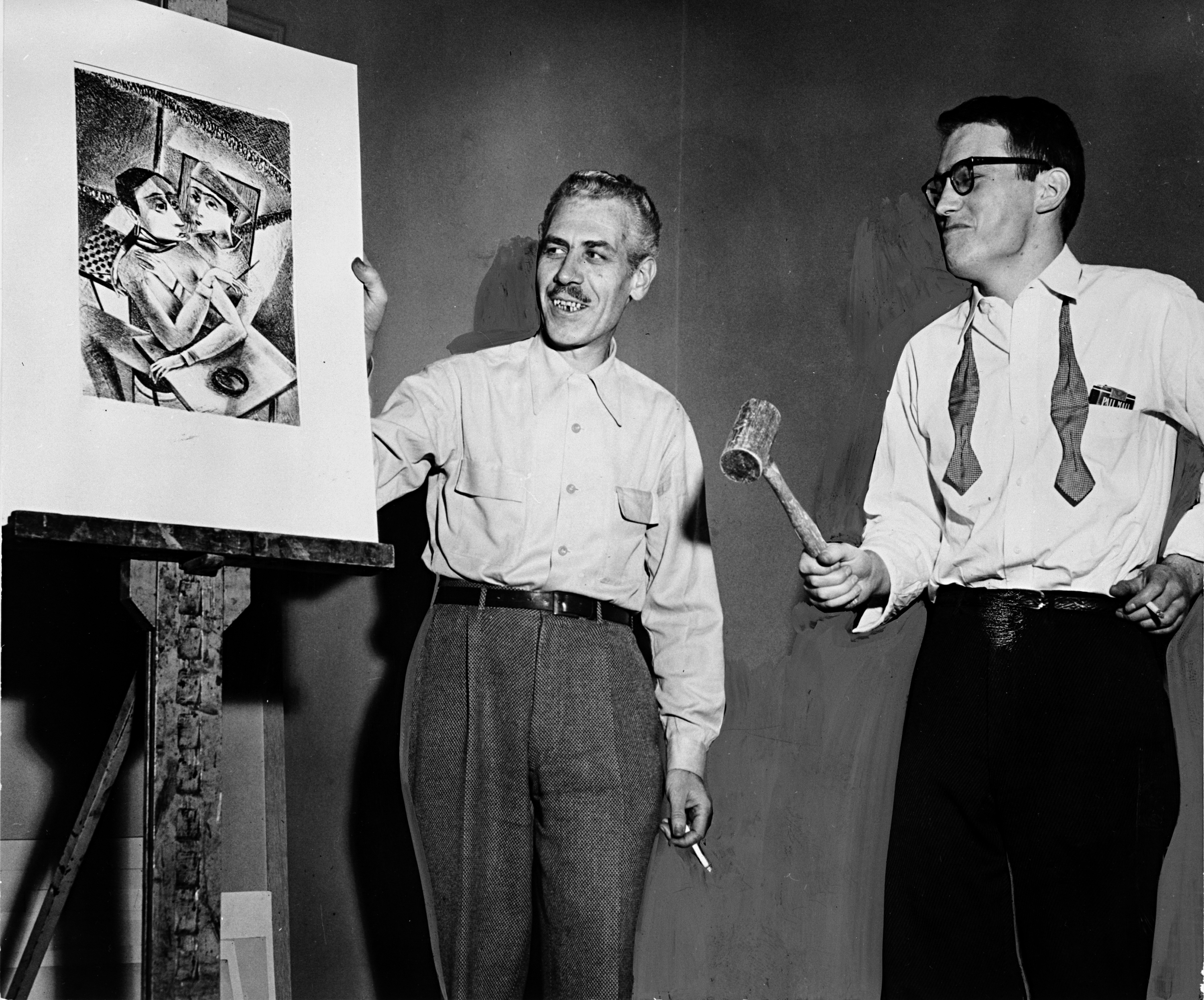 Louis Bunce (l) and Manuel Izquierdo serve as auctioneers at Portland Art Museum's benefit for Michele Russo, Nov. 1951.