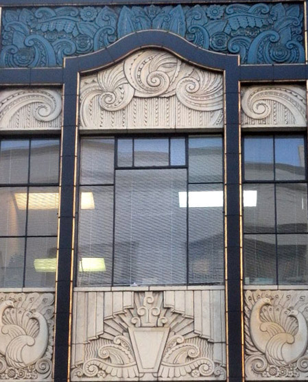 1930s facade of the Charles F. Berg Building (615 SW Broadway) is a rare example of Art Deco terra cotta in Portland.