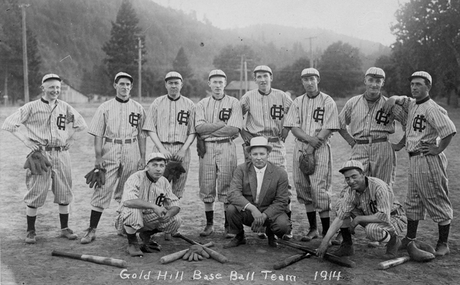 Gold Hill Baseball Team, 1914. Back: Charlie Reed, Harry Porter, unk., unk., Alvie Walker, Bill Kelsey, Doc Eatings, unk.; front: Blackington, coach John Cameron, unk.