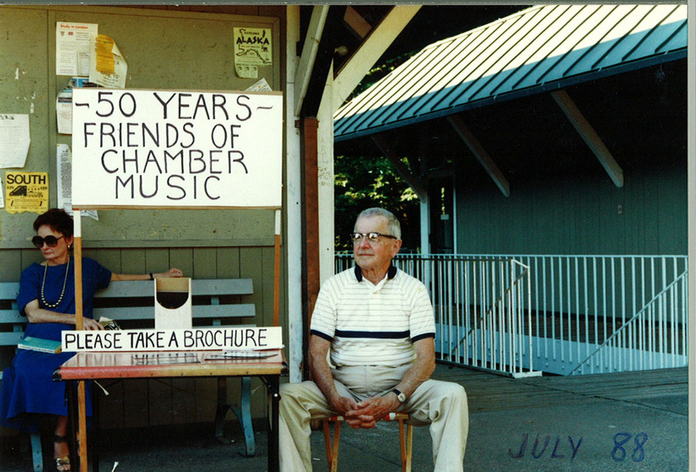 Ed Heyde distributing brochures at Chamber Music Northwest concert during the 50th anniversary of the Friends of Chamber Music, 1988.