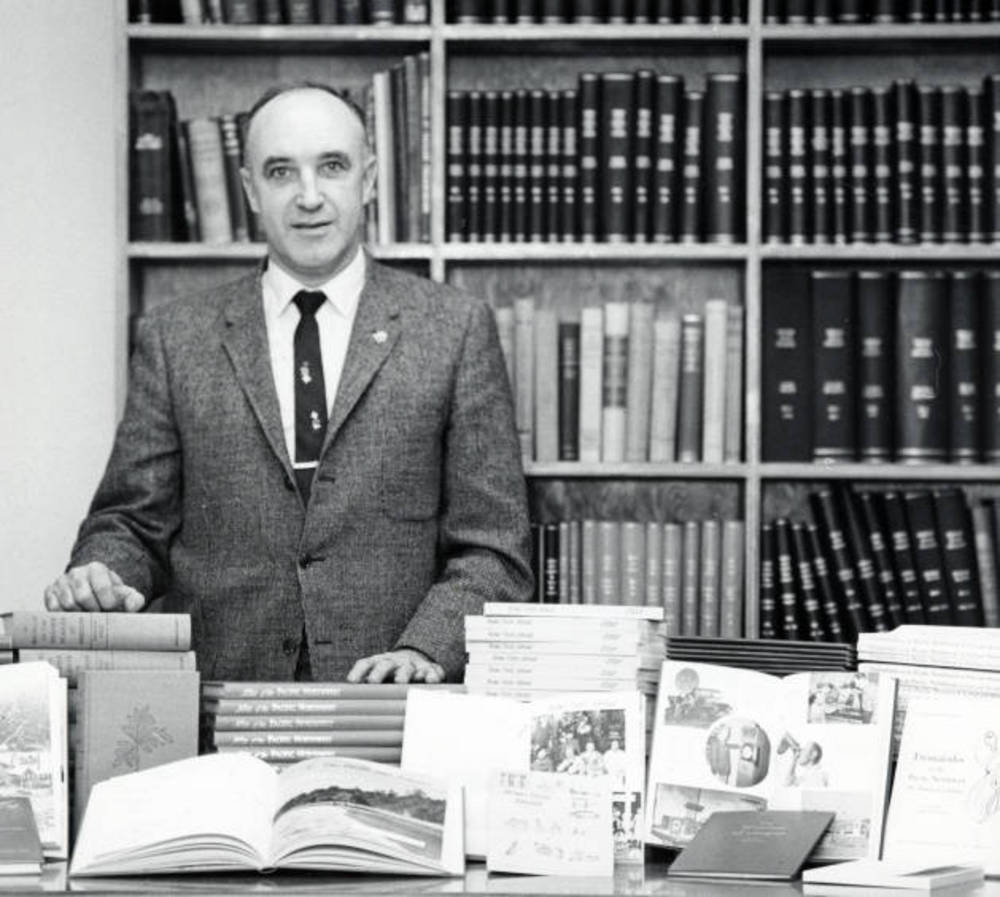 J. K. Munford with Oregon State University Press books, 1960.
