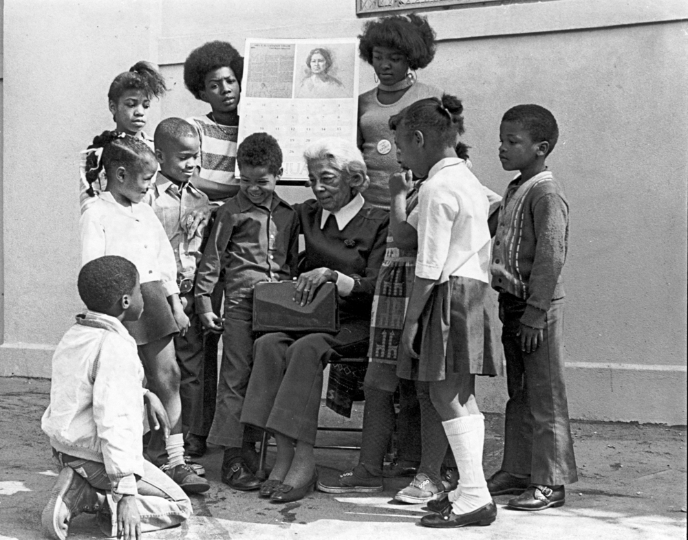 Beatrice Morrow Cannady with school children in 1973.