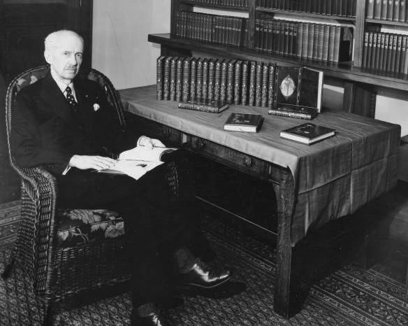George Peavy at desk in the university library, 1934.
