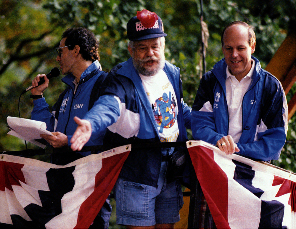 Announcer Ted Gilbert (left), Portland Mayor Bud Clark, and Event Director Les Smith herald the start of the 1989 Portland Marathon.