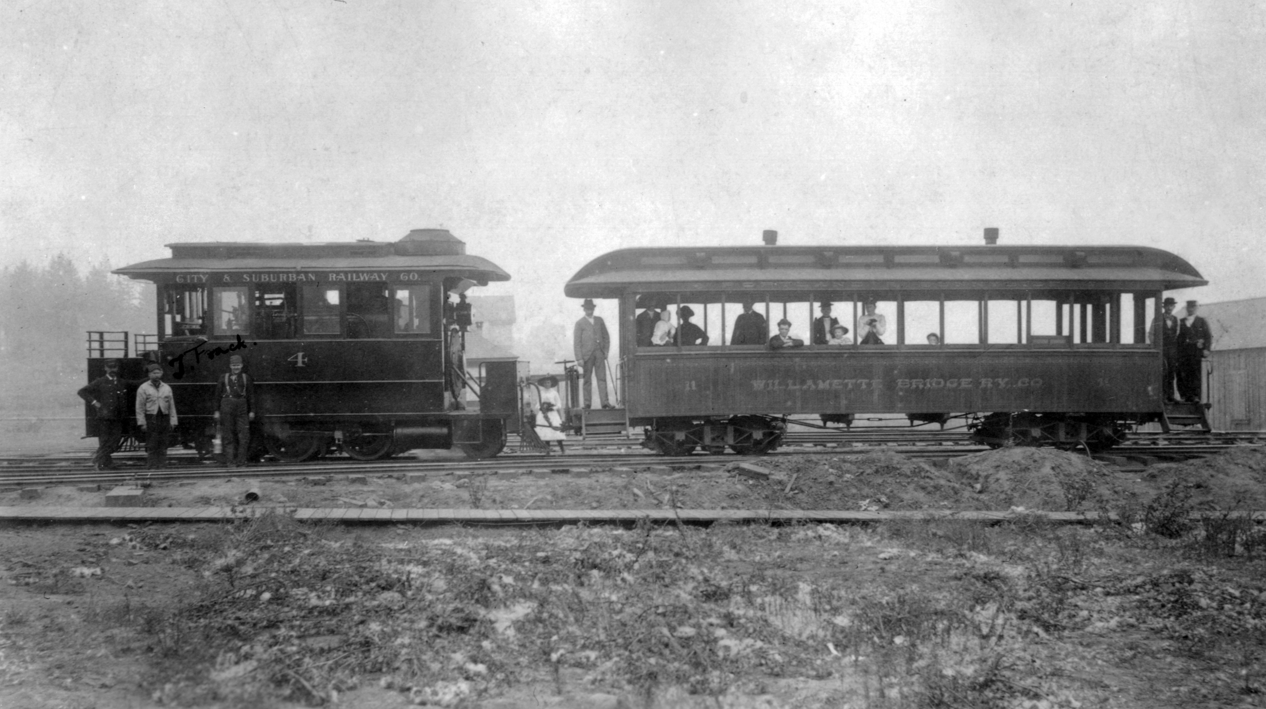 Steam dummy motor No. 4 with coach No. 11 at east end of Mount Tabor Motor Line near present-day SE 69th Ave. and Belmont St., about 1890.