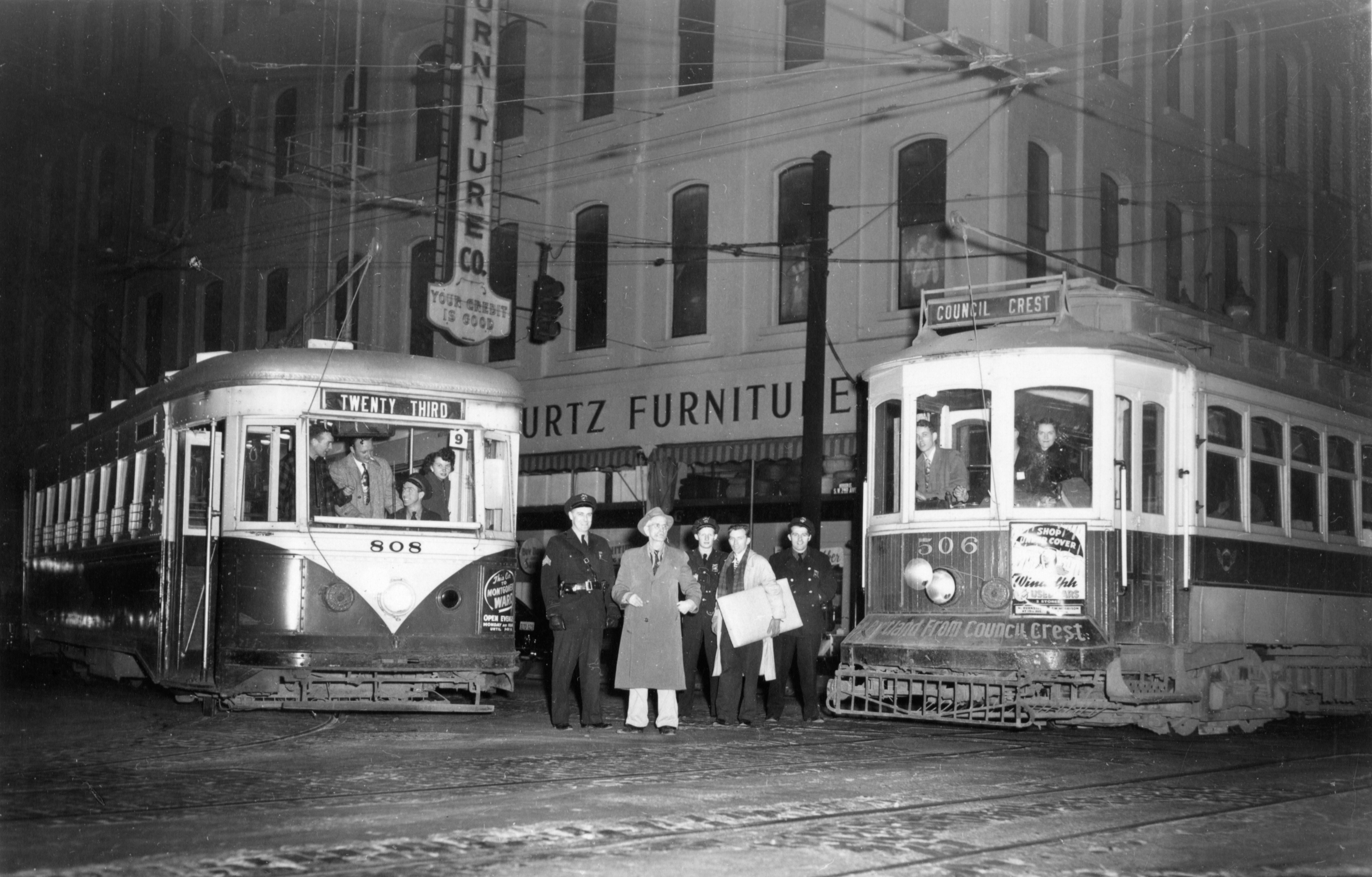 Car 808 and Council Crest Line car 506 meet at SW 2nd Ave. and Morrison St. on last day of service, Feb. 26, 1950.
