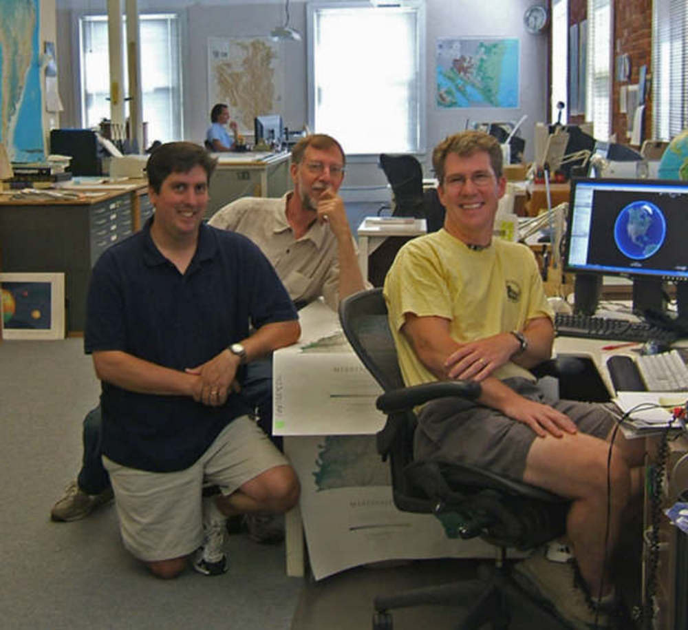 Cartography staff at Raven Maps.