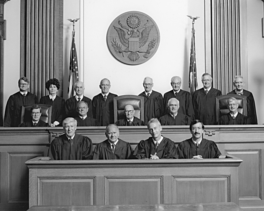 Gus Solomon with group of judges.