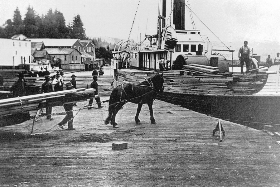 Loading lumber at Toledo Fir and Spruce Company dock, about 1910.