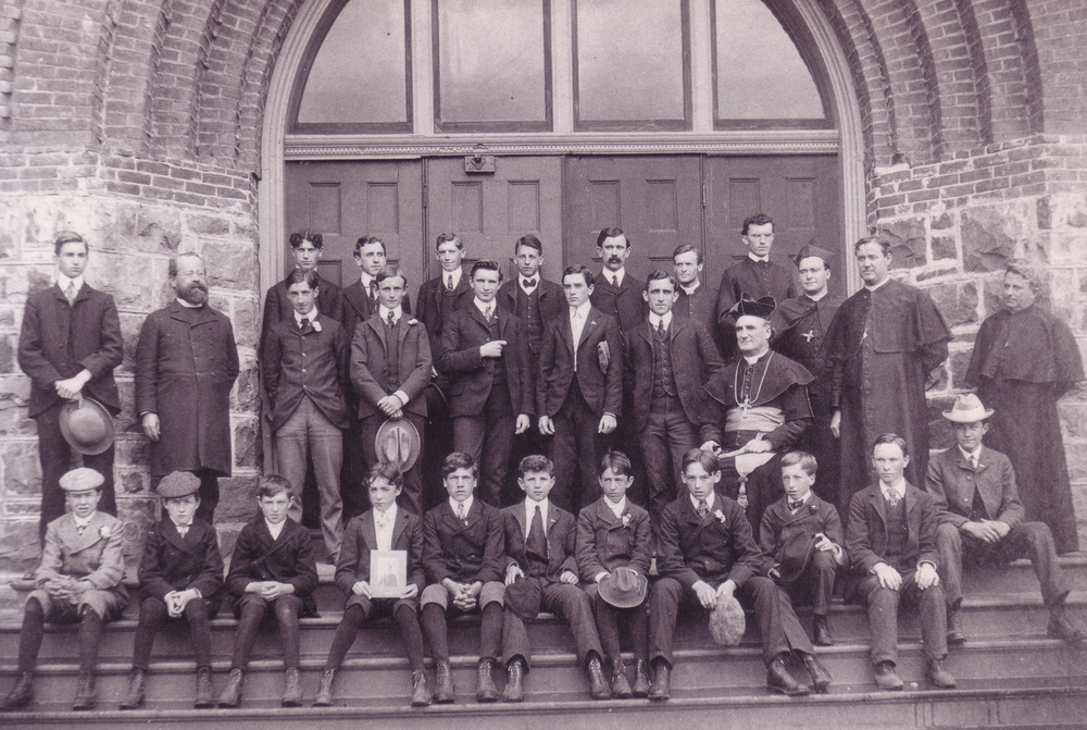 Students and faculty, including founder Archbishop Alexander Christie, in 1902.