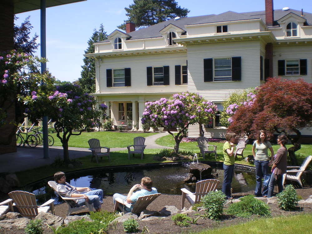 Western Seminary students at fish pond behind Armstrong Hall.