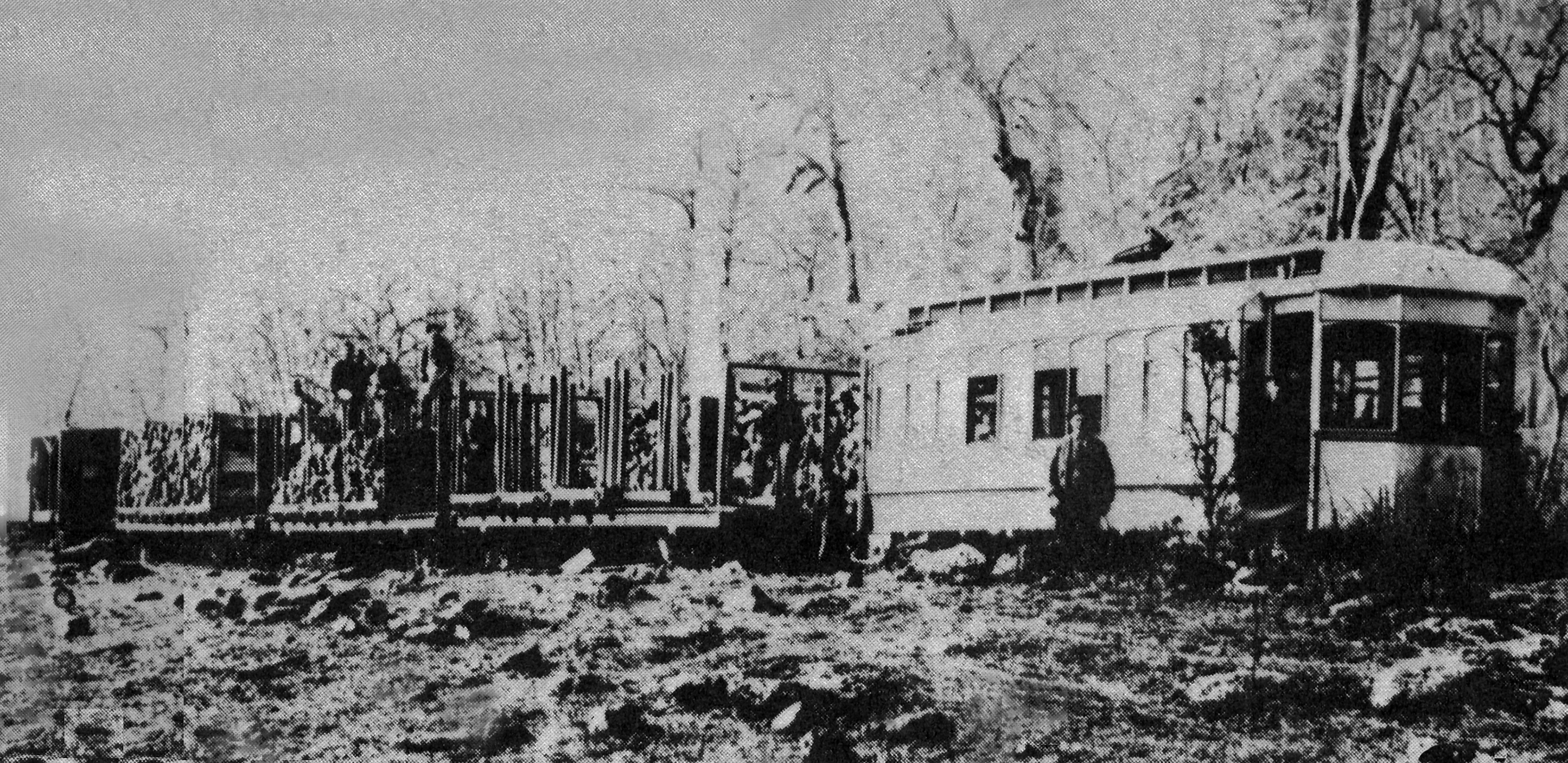 Willamette Falls Railway Brill trolley waits for a wood train to clear the line.