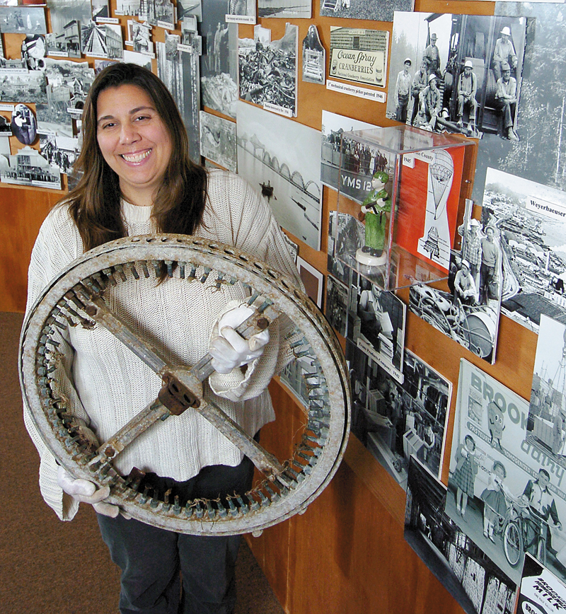 Vicki Wiese of the Coos Historical & Maritime Museum holds part of a Japanese balloon bomb from World War II, Jan. 2009.