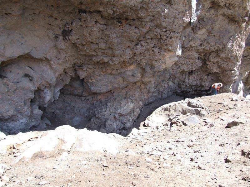 Dirty Shame Rockshelter, with evidence of looting and heavy equipment damage.