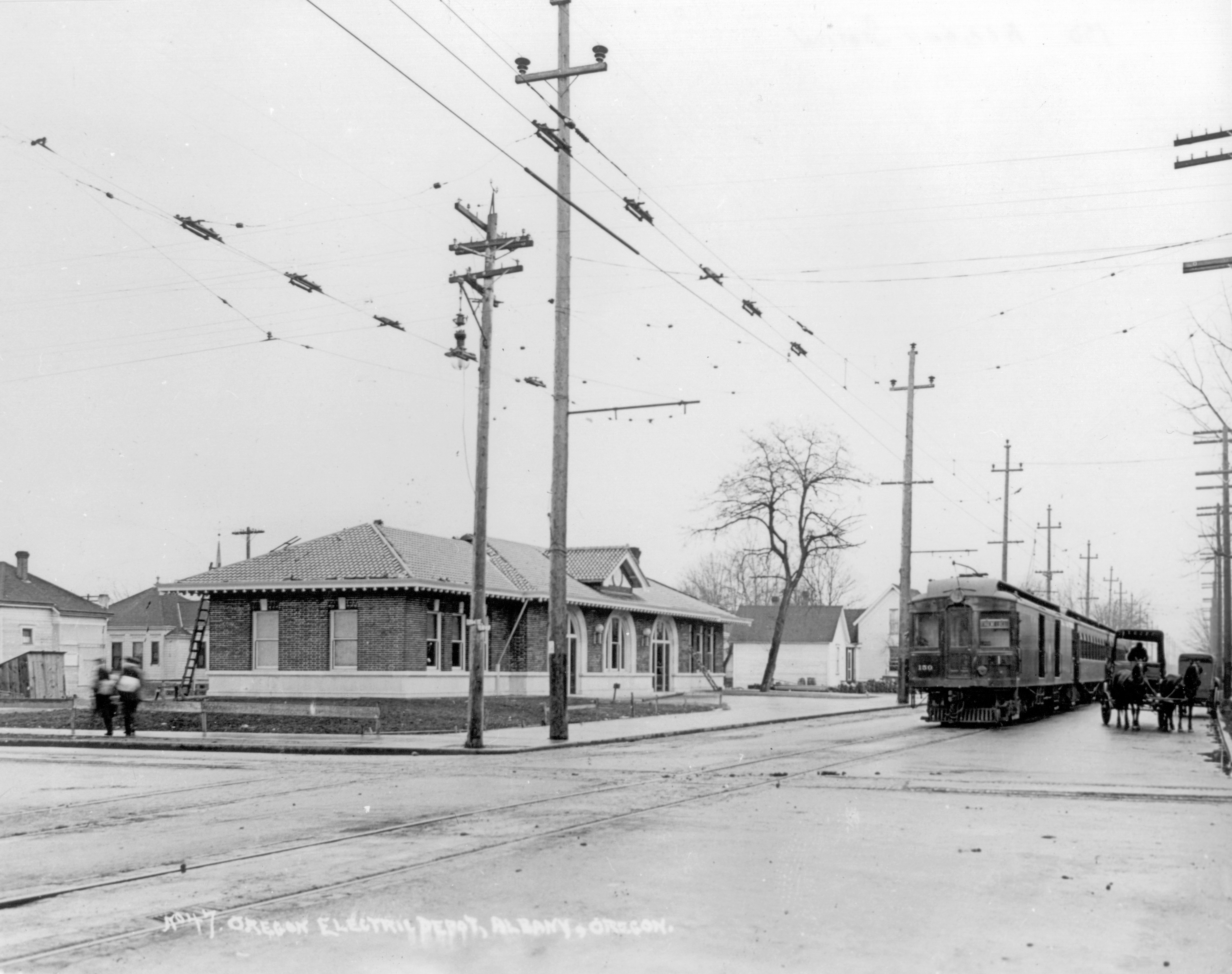 Oregon Electric baggage car 150 with train at Albany, about 1912.