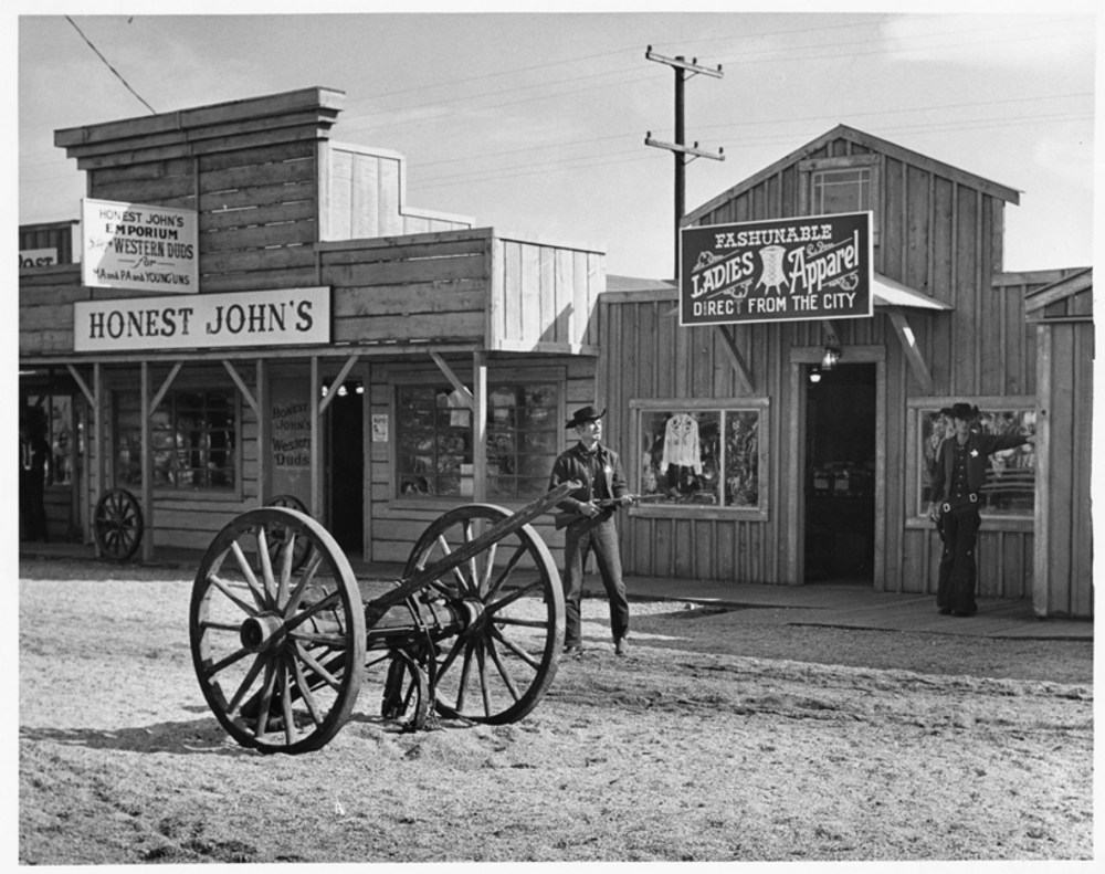 "Doc Holliday and his deputy, the Durango Kid, stage gunfights daily in the Frontier Town," Oregon Centennial Expo, 1959.