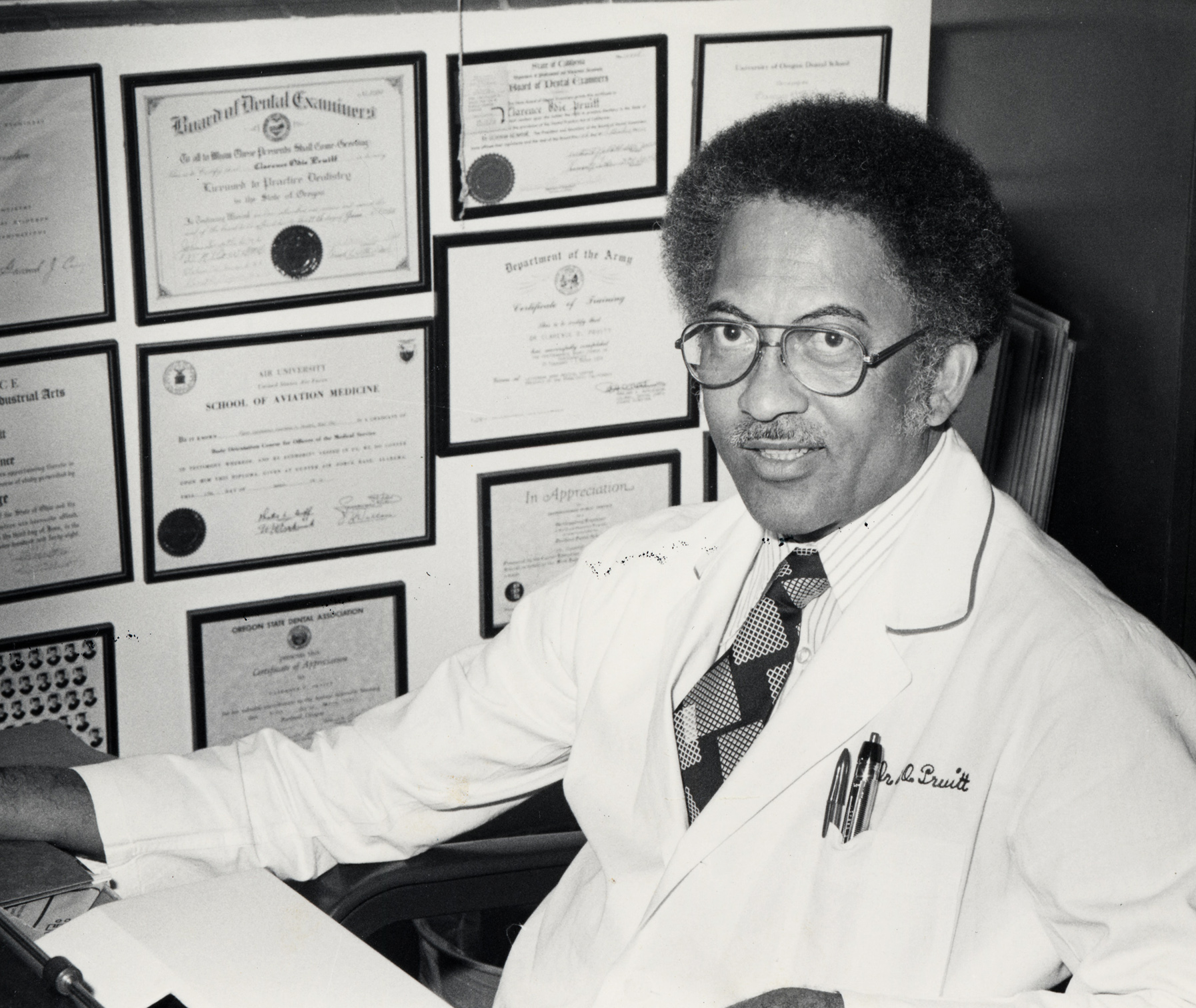 Dr. Clarence Pruitt at his desk.