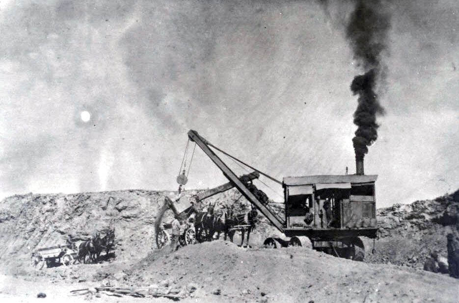 Steamshovel digging fill materials for dam