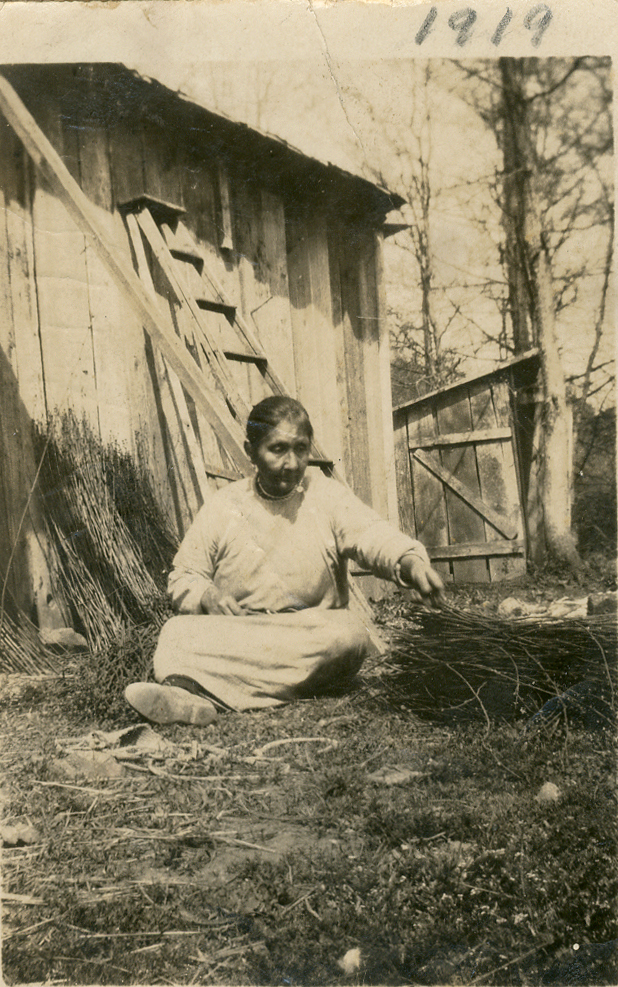 Victoria Howard sorting recently gathered hazel shoots, Grand Ronde.